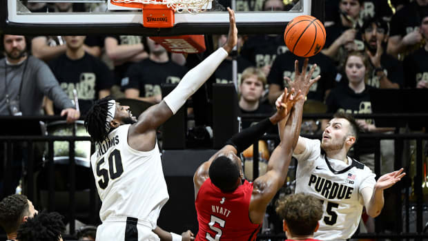 Sasha Stefanovic goes for the rebound in the Purdue versus Rutgers rematch.